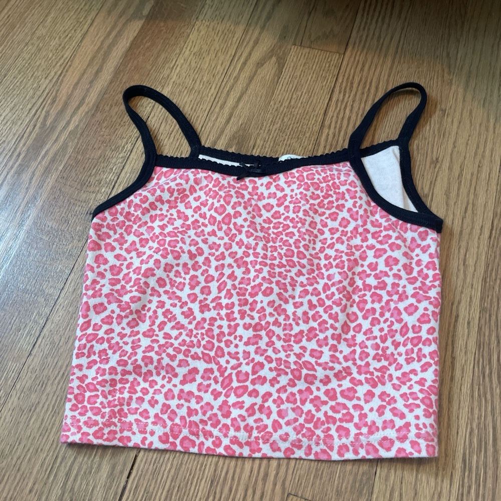 pink and white leopard print tank top in good condition size: m